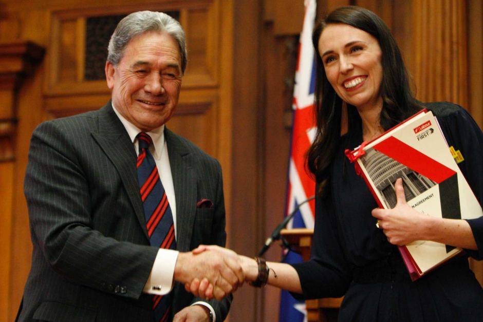 Jacinda Ardern shaking hands with Winston Peters