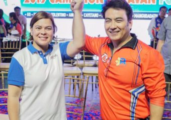 Sara Duterte raising the hand of Bong Revilla