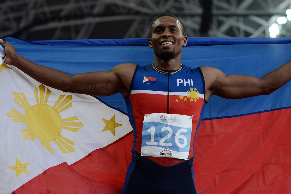 Eric Cray waving the Philippine flag