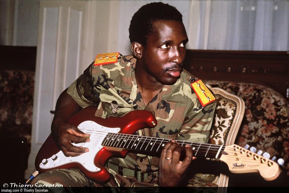 Thomas Sankara playing electric guitar