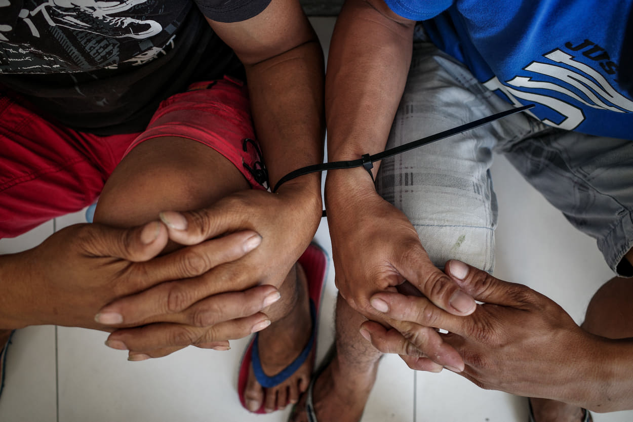 San Roque demonstrators arrested by the Philippine National Police. Photo by Mariel Guerrero for Pinoy Weekly.