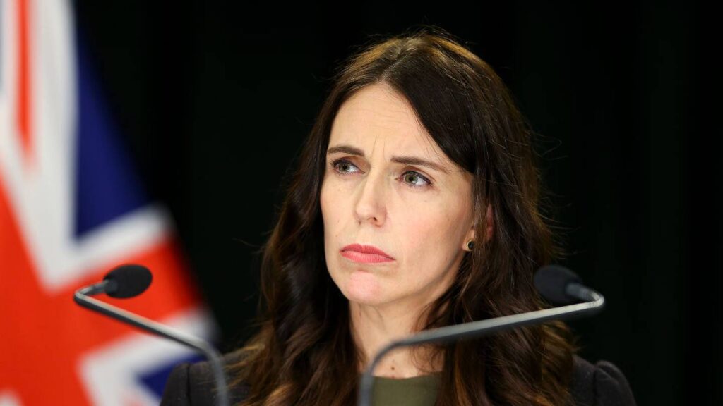 Prime Minister Jacinda Ardern listens during a press conference.