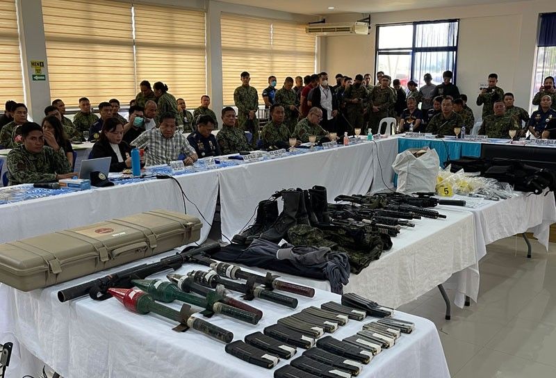 Authorities present the weapons believed to have been used by the suspects in the assassination of Governor Roel Degamo and eight other victims, in what is now known as the Pamplona Massacre. (Photo: Romeo D. Marantal/Philstar)