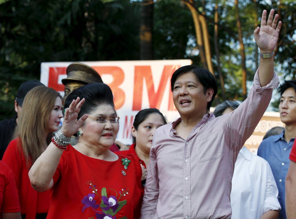 Vice Presidential candidate Ferdinand Marcos Jr (R) and his mother former First Lady Imelda Marcos wave to supporters during a political rally in Manila. (Photo: REUTERS/Erik De Castro)