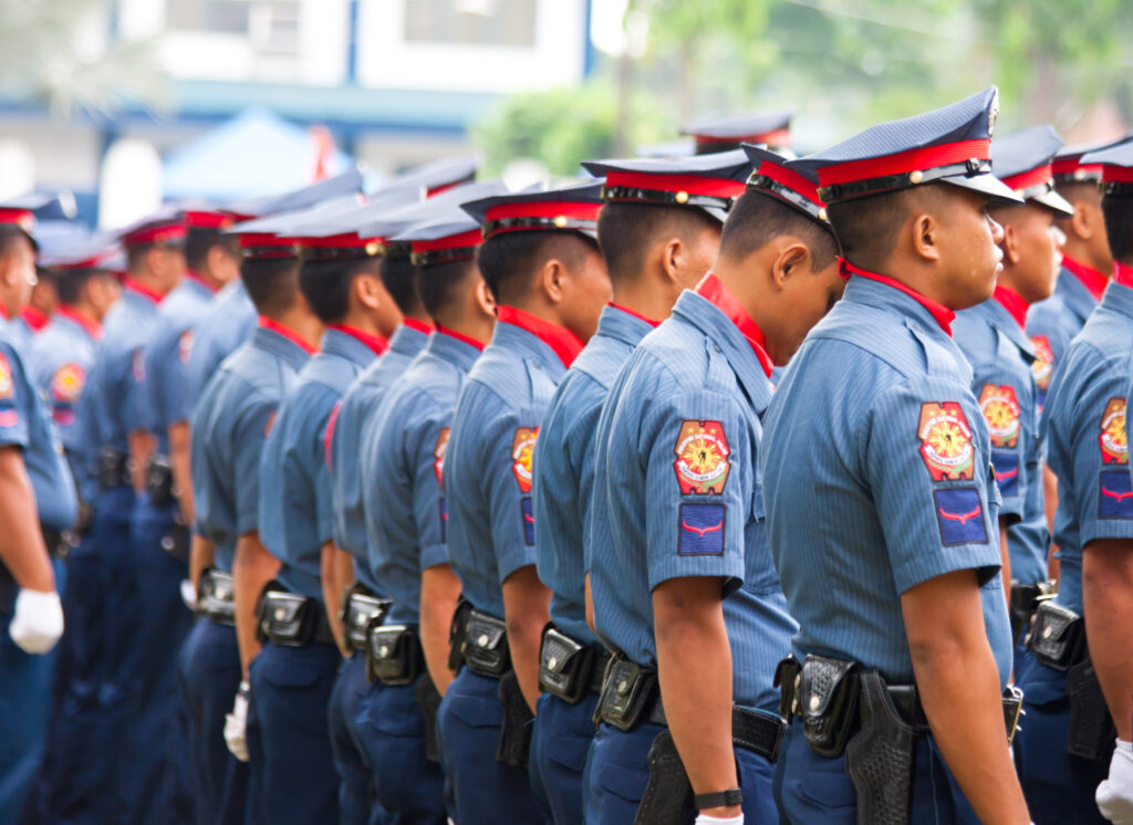Stock photo of Philippine police officers standing in a line. Photo from Dreamstime.