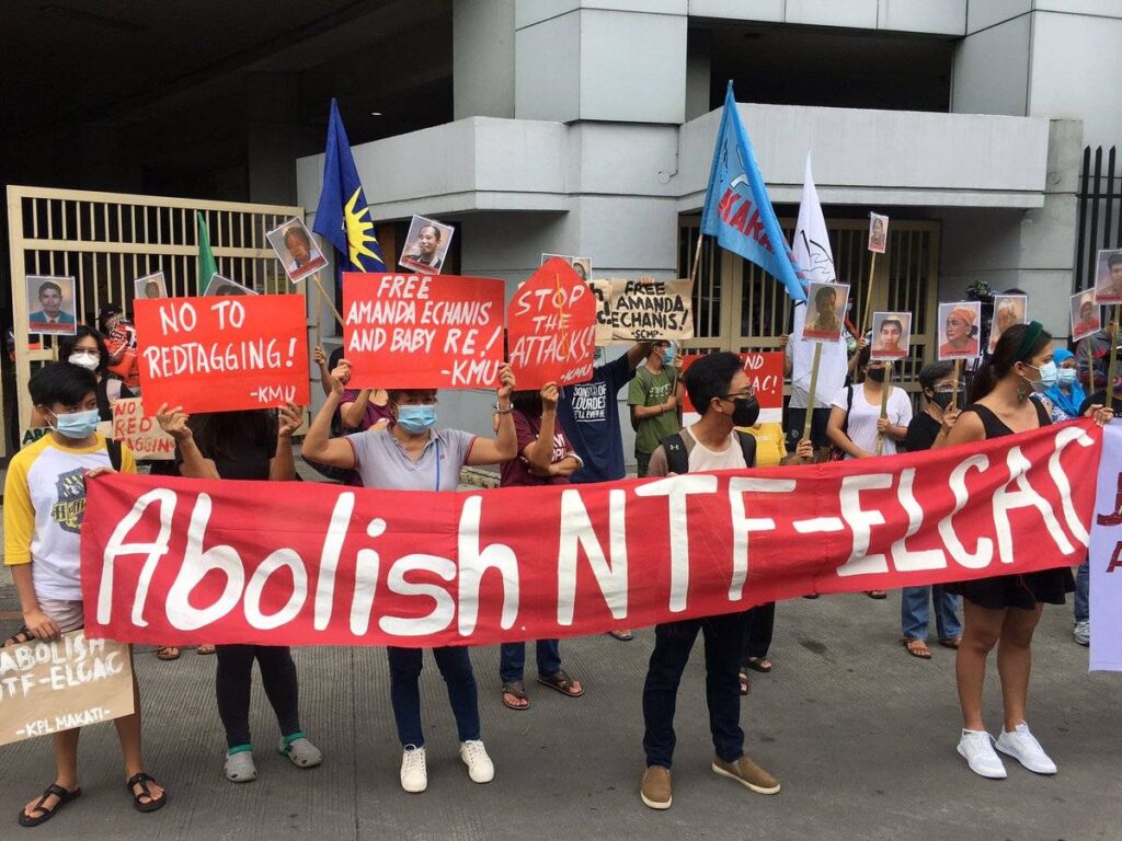 Activists call for the abolition of the NTF-ELCAC, during a protest against the abduction and wrongful accusations against Jhed Tamano and Jonila Castro. (Photo: Student Christian Movement of the Philippines/Facebook)