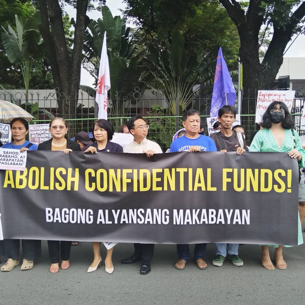 Progressive groups protest against Sara Duterte's confidential and intelligence fund request. They are joined by representatives belonging to the Makabayan Bloc, starting second from left: Rep. Arlene Brosas, Rep. France Castro, and Rep. Raoul Manuel. (Photo: BAYAN/Facebook page)