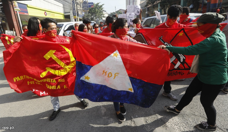 Members of the communist underground movement stage a lightning rally during May Day celebrations. (Photo: Communist Party of the Philippines)