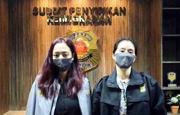 Cassandra Ong (left) and Zhang Mier, more known as Shiela Guo - who pretended to be the sister of dismissed ex-Bamban town mayor Guo Hua Ping/Alice Guo, are photographed after they were arrested by Indonesian authorities after fleeing the Philippines.